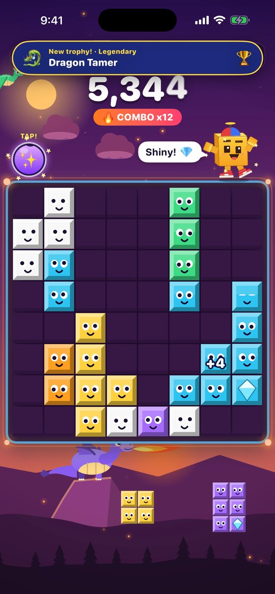 Dragon Peaks, with a dragon on its rock below the board